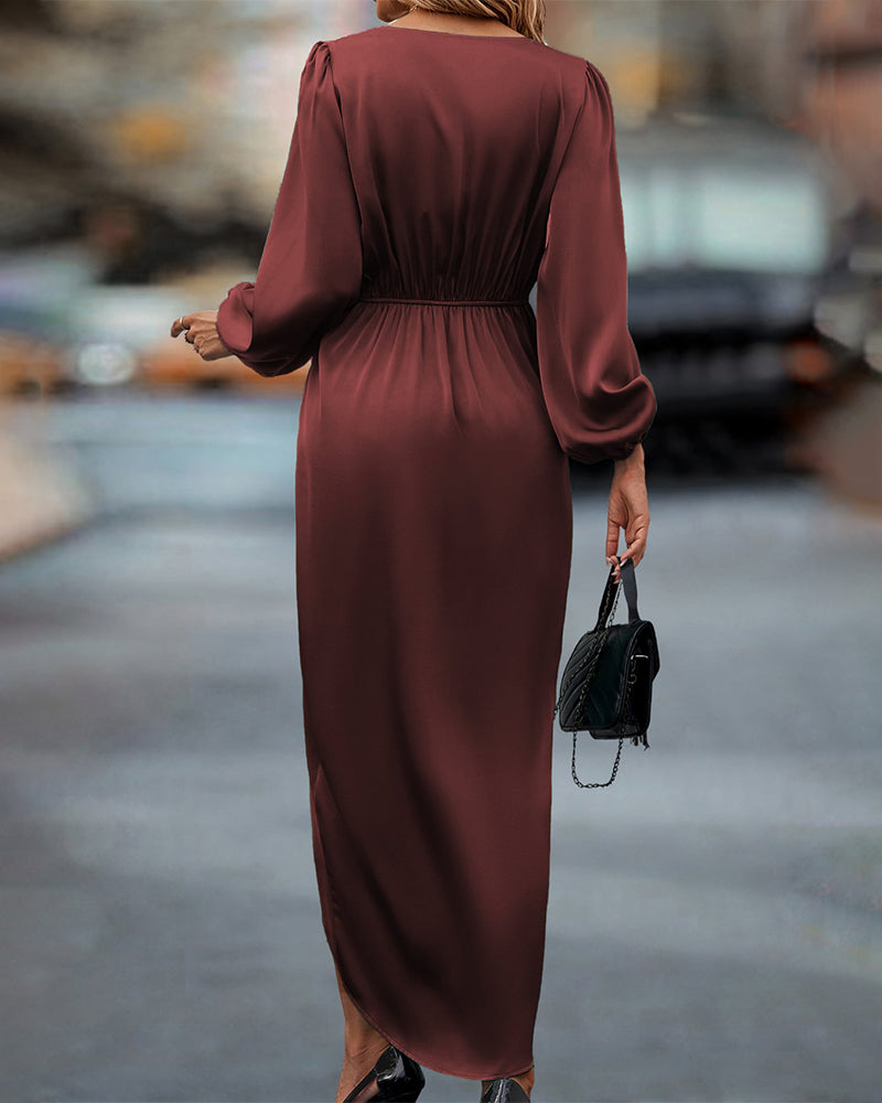 Elegantes Kleid mit Laternenärmeln und V-Ausschnitt 1