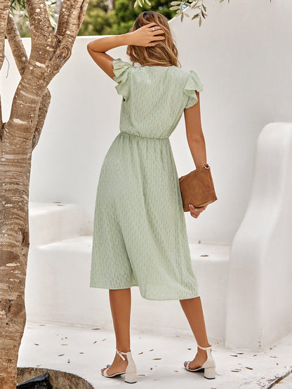 Hellgrünes Midikleid mit V-Ausschnitt 2